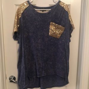 Oversized distressed tee with sequin sleeves